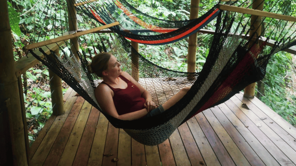 woman enjoying hammock in the jungle
