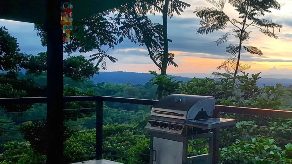 An off-grid home outside balcony with grill