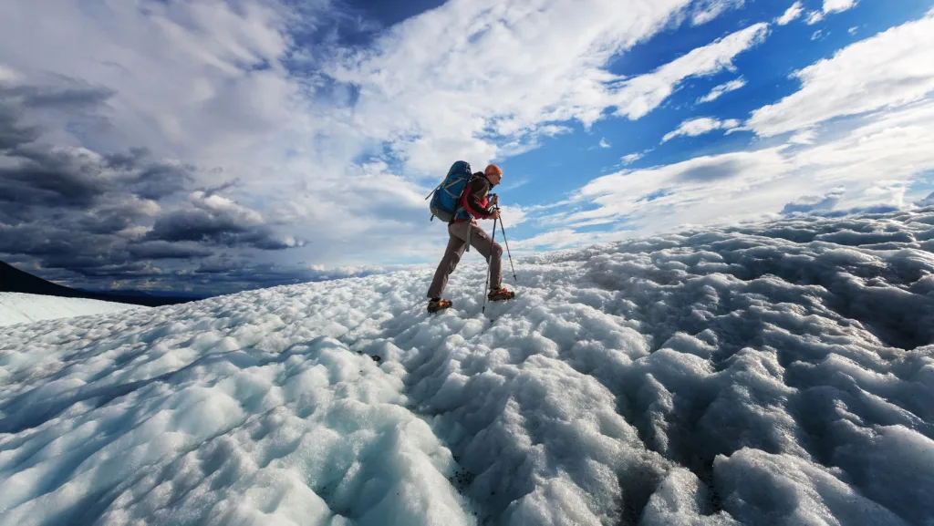 Man hiking a glacier in Alaska